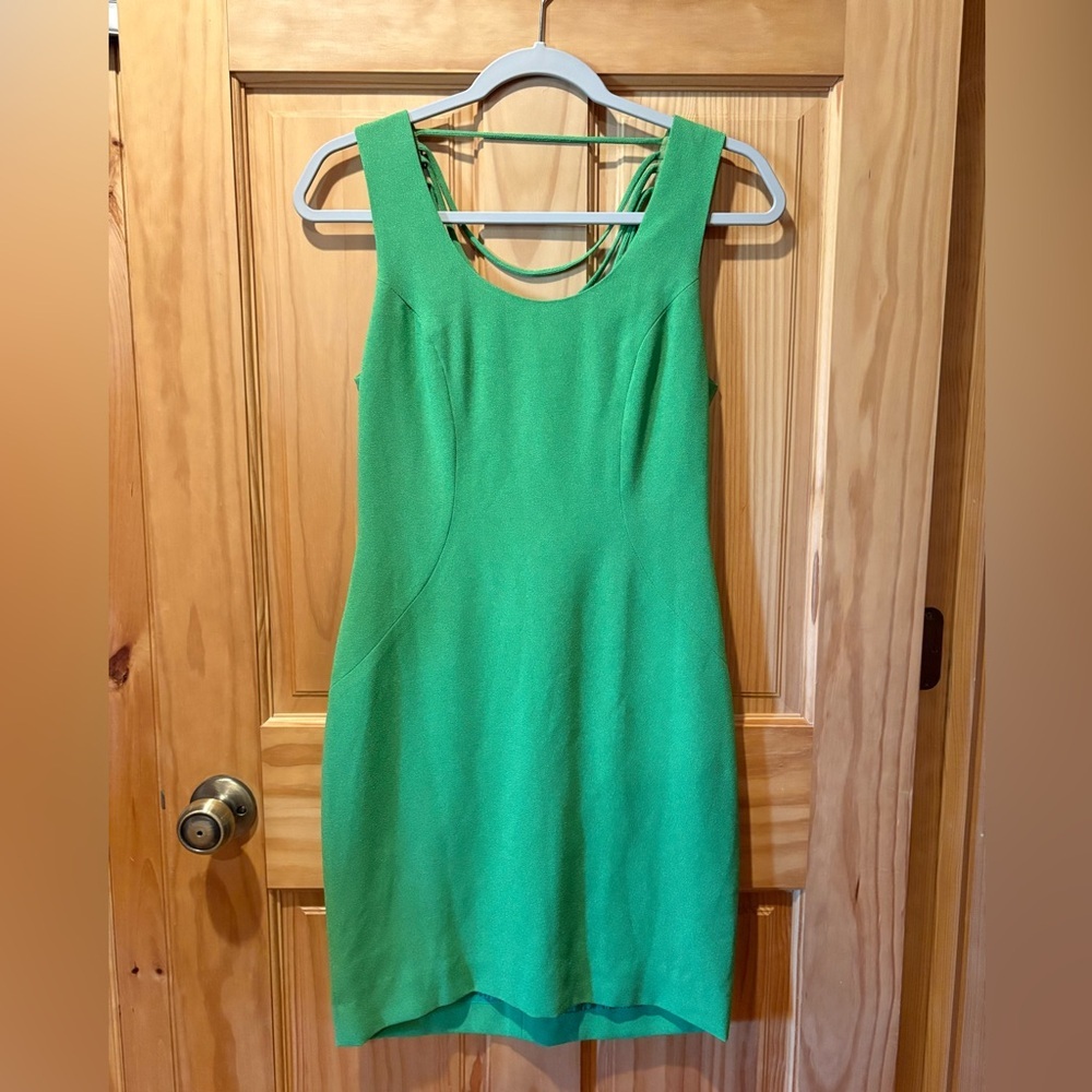 Nicole Miller Sleeveless form-fitting multi strap back dress women’s 4